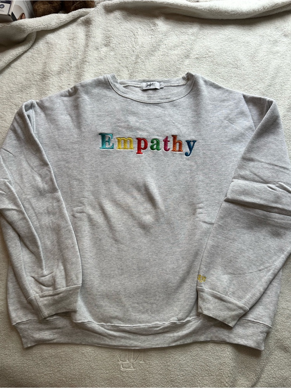 The Mayfair group empathy sweatshirt